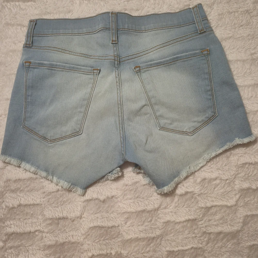 Fashion Nova Light Blue‎ Distressed Denim Cutoff Shorts